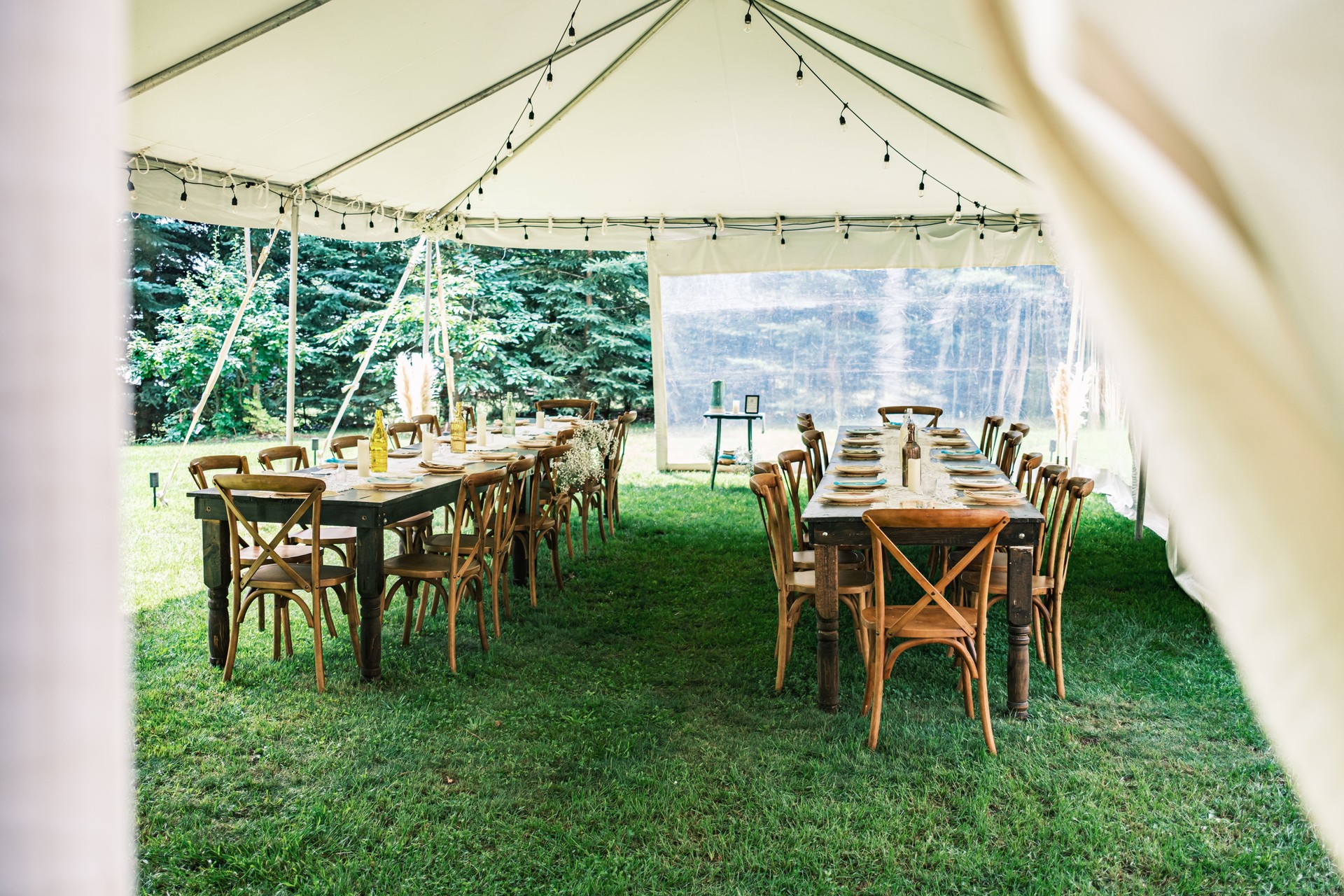 Table setting decor inside wedding tent